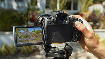 Camera taking picture of house exterior